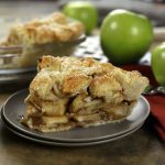 A slice of Apple Pie with homemade filling and from-scratch crust.