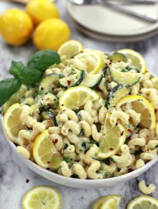 A big pasta bowl of Lemon Ricotta Pasta sitting on a marble countertop.