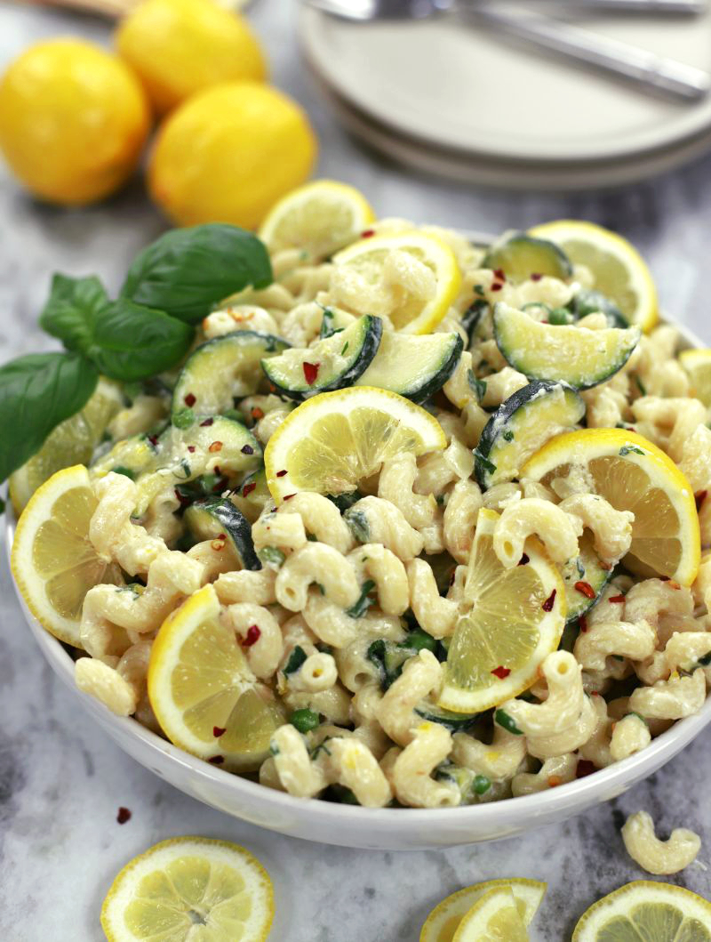 A big pasta bowl of Lemon Ricotta Pasta sitting on a marble countertop.