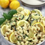 Curly Pasta with Ricotta and Lemon served with sautéed zucchini and sweat peas.