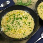 Chickpea Pasta Soup garnish with freshly grated Parmigiano Reggiano and chives.